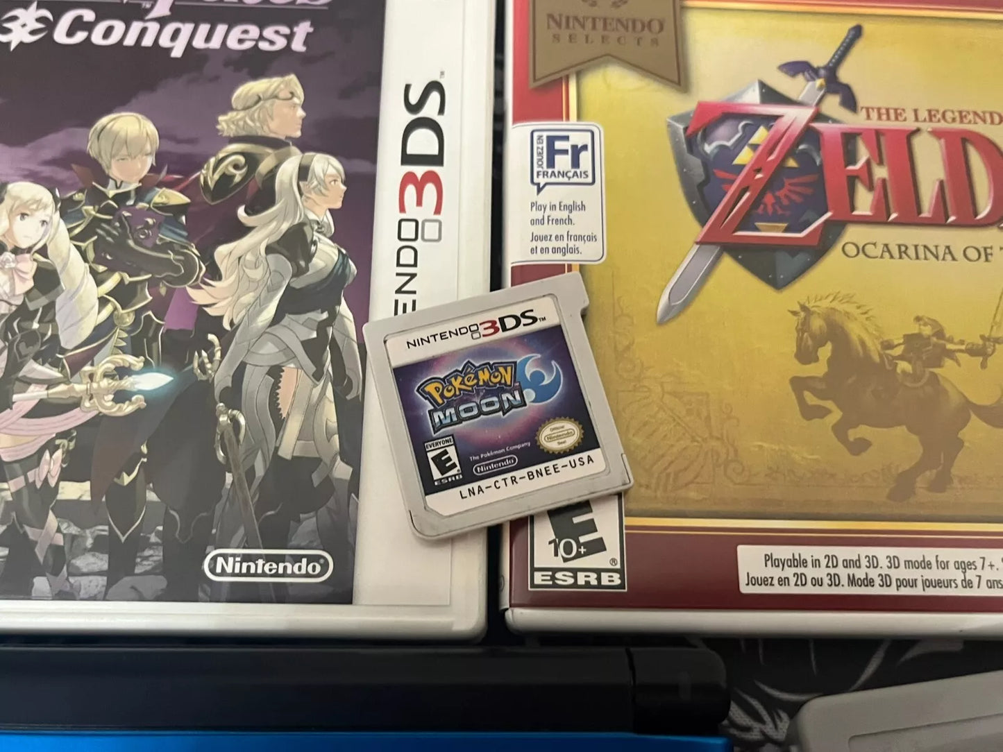 Nintendo 3DS XL Handheld System - Blue/Black Bundle + Fire Emblem Zelda Pokemon