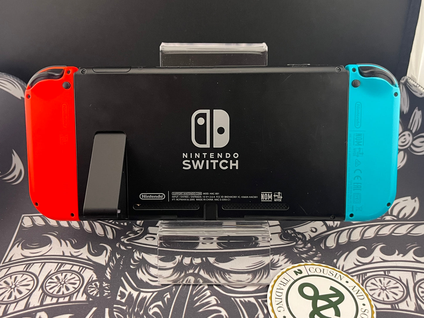 Nintendo Switch Red and Blue Joy Cons with Arms and Pro Controller