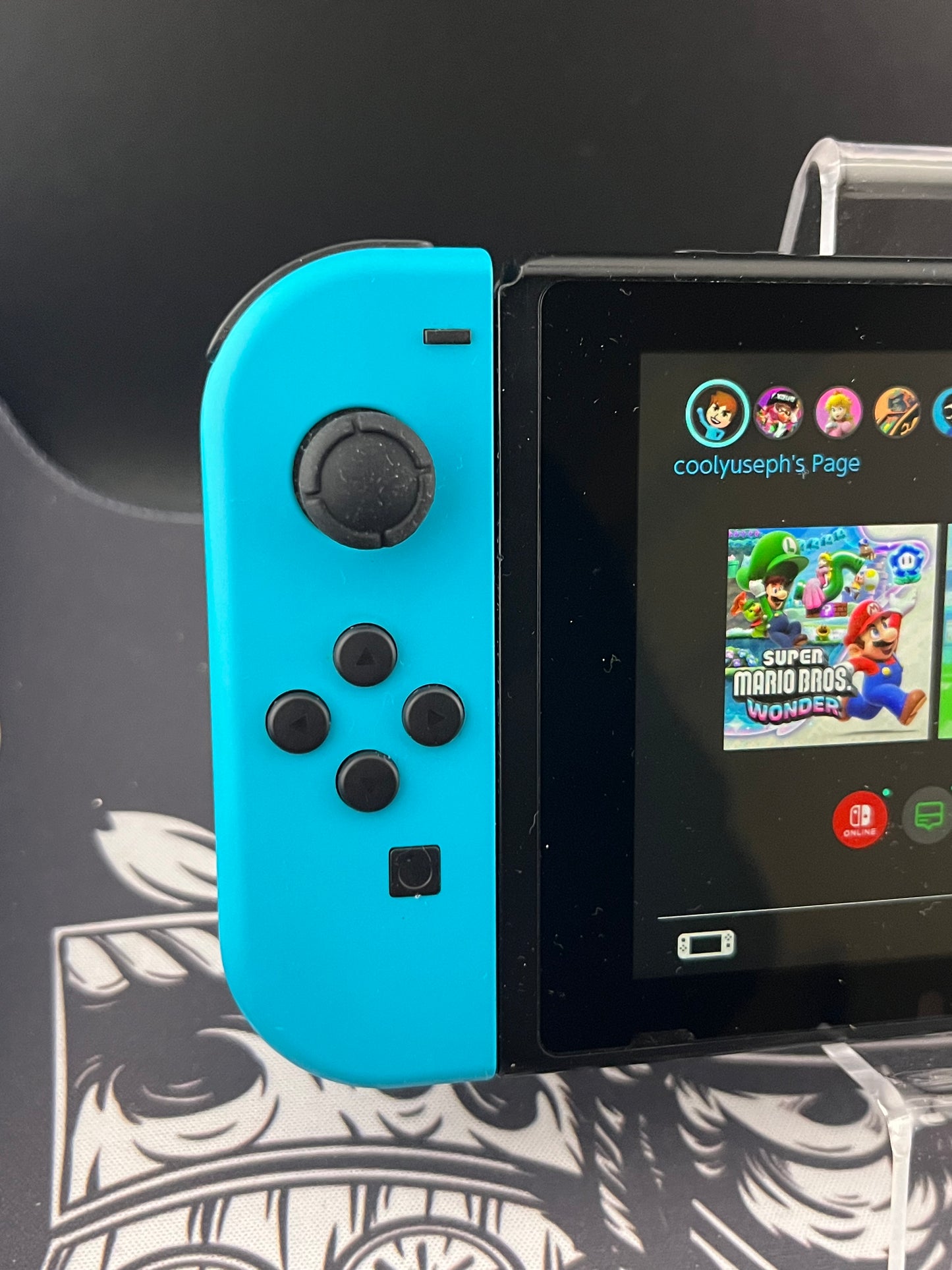 Nintendo Switch Red and Blue Joy Cons with Arms and Pro Controller