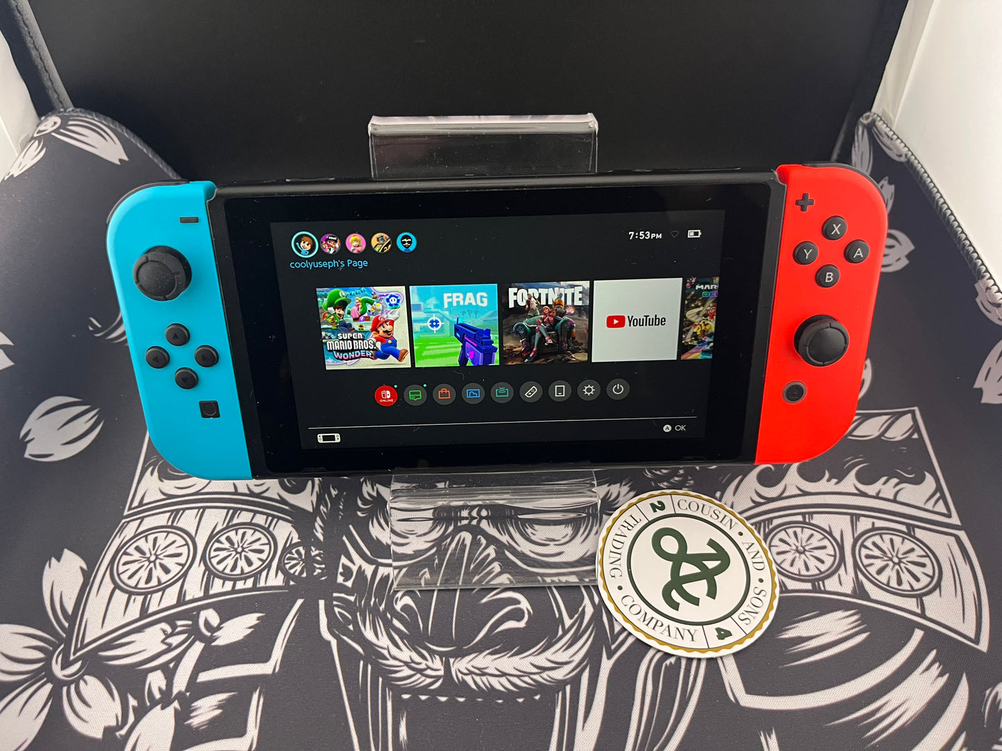 Nintendo Switch Red and Blue Joy Cons with Arms and Pro Controller