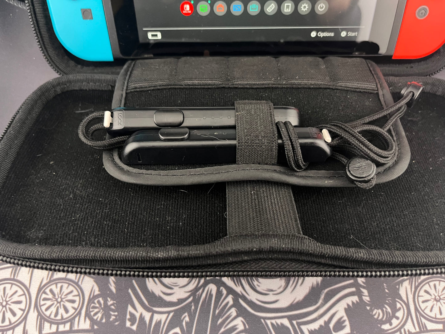 Nintendo Switch Red and Blue Joy Cons with Arms and Pro Controller