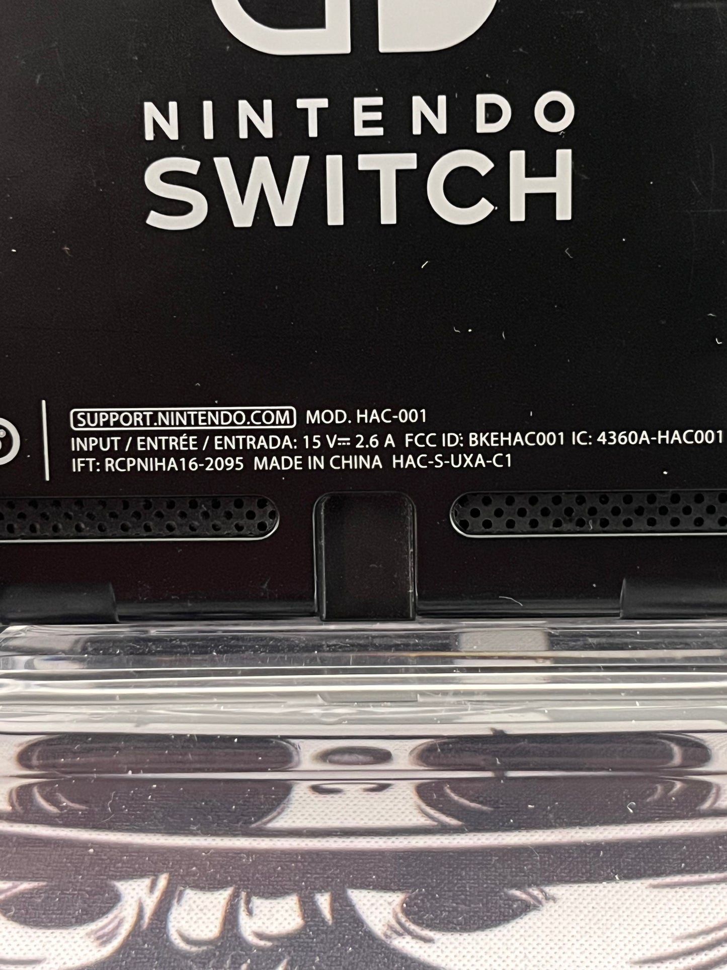 Nintendo Switch Red and Blue Joy Cons with Arms and Pro Controller
