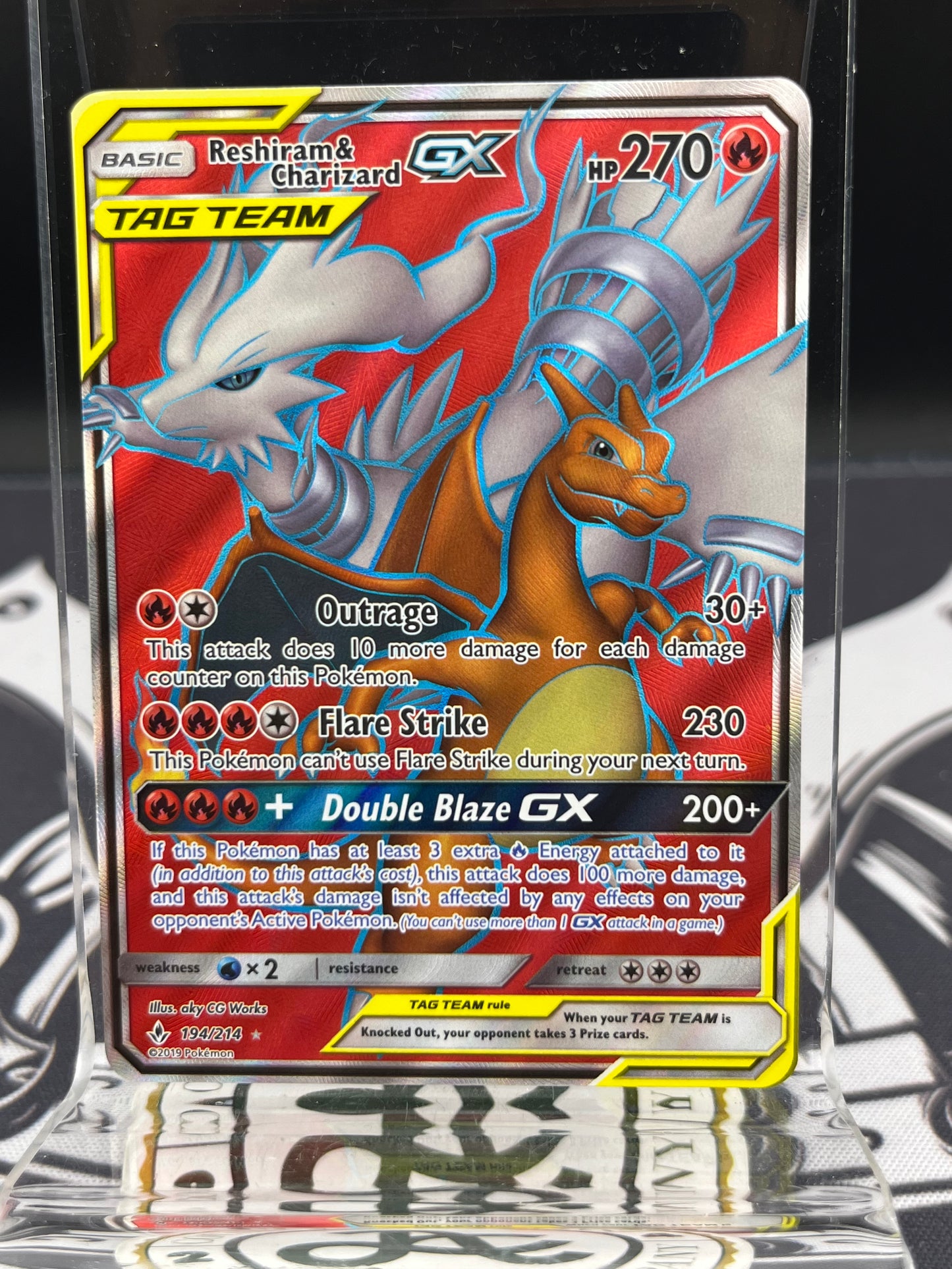 Reshiram & Charizard GX - 194/214 NM
