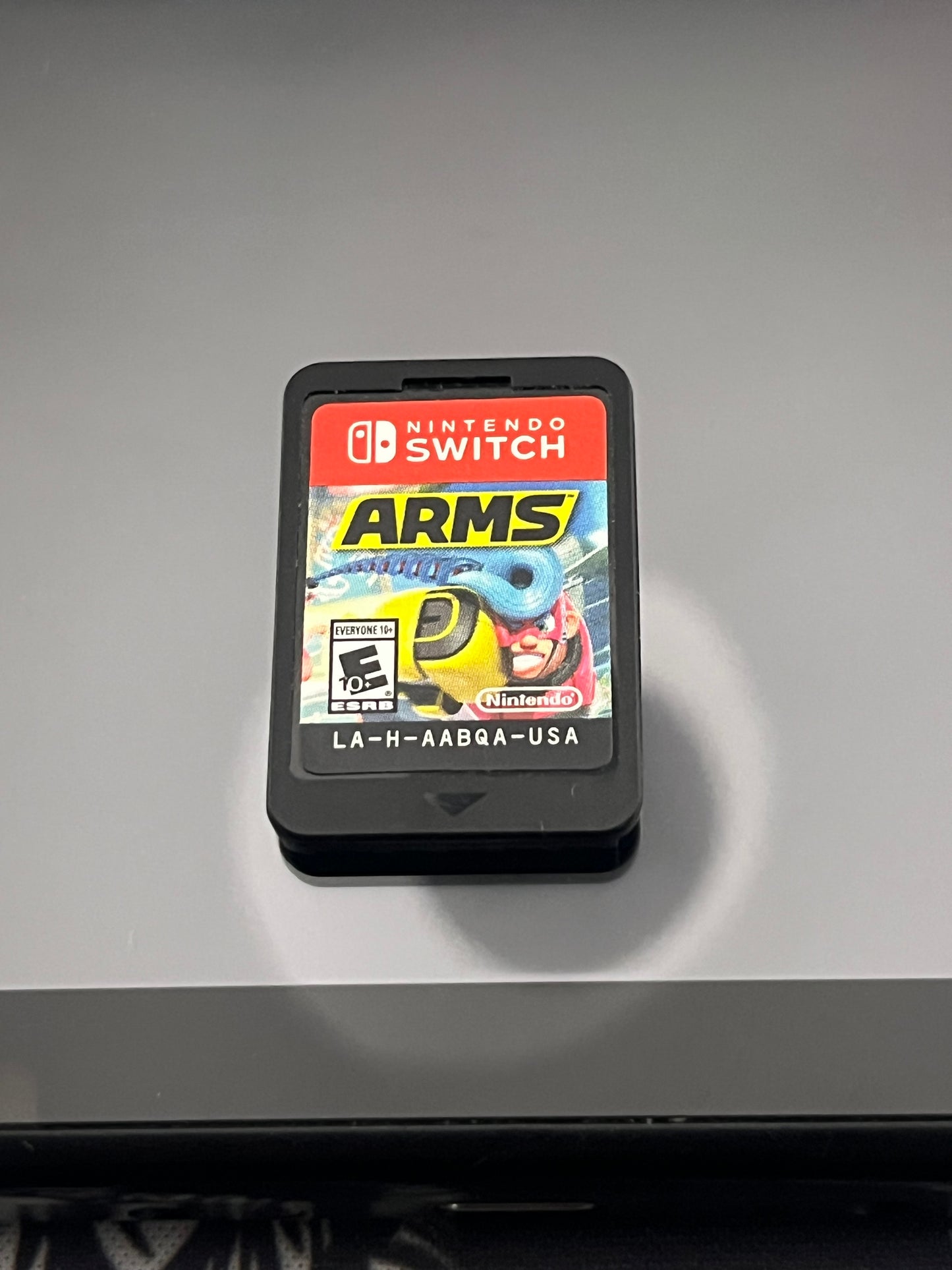 Nintendo Switch Red and Blue Joy Cons with Arms and Pro Controller