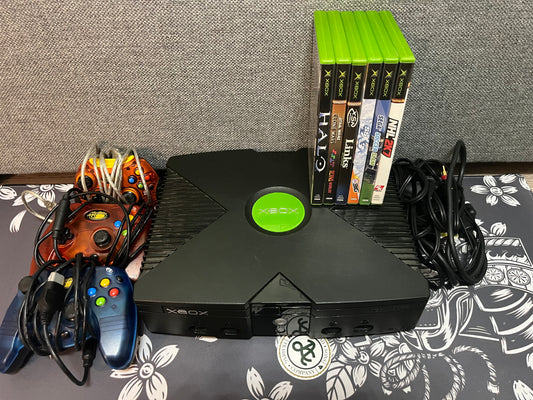 Xbox with 6 games and 3 third party controllers